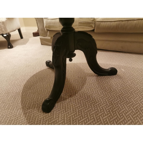 363 - Ebonised coffee table raised on turned column and outswept feet in the Victorian manner {63 cm H x 1... 