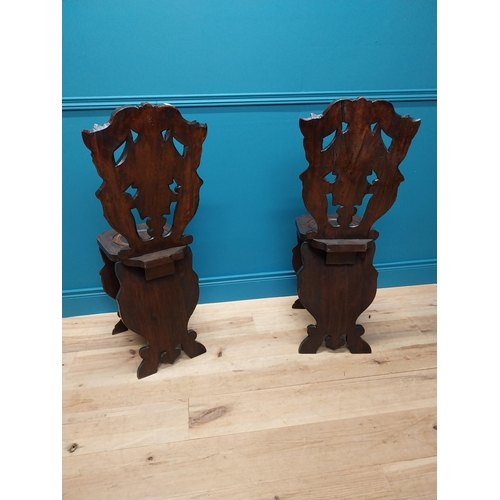 364 - Pair of 19th C.  carved walnut armorial hall chairs . {100 cm H x 40 cm W x 40 cm D}.