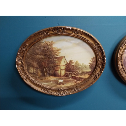 366 - Pair of Farmyard scene coloured prints mounted in oval giltwood frames { 38cm H X 48cm W }.