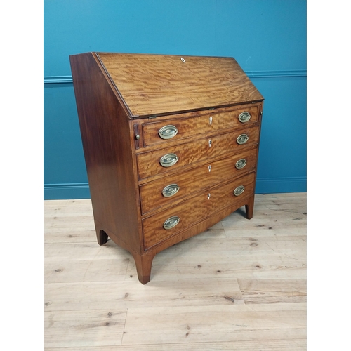 370 - Early 19th C. mahogany bureau with fitted interior, four graduated drawers and handles raised on bra... 