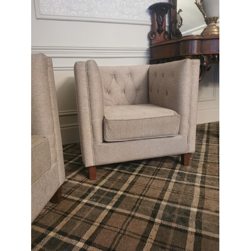 48 - Pair of deep buttoned upholstered mahogany club chairs raised on tapered legs {80 cm H x 83 cm W x 7... 