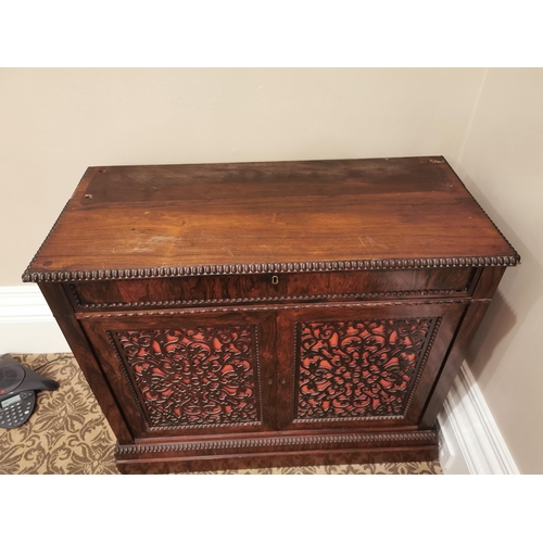 69 - 19th. C. rosewood side cabinet the single drawers above two fretwork panelled doors raised on plinth... 