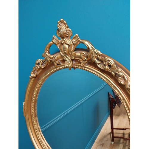 73 - Good quality gilt circular wall mirror with bevelled glass {70 cm H x 60 cm W}.