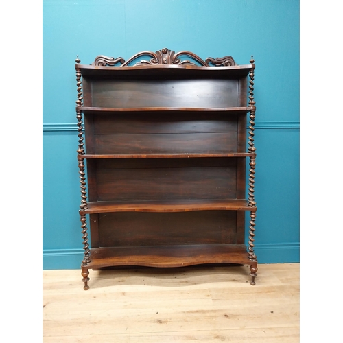 75 - William IV rosewood waterfall bookcase with four serpentine shelves  { 148cm H X 105cm W X 30cm D