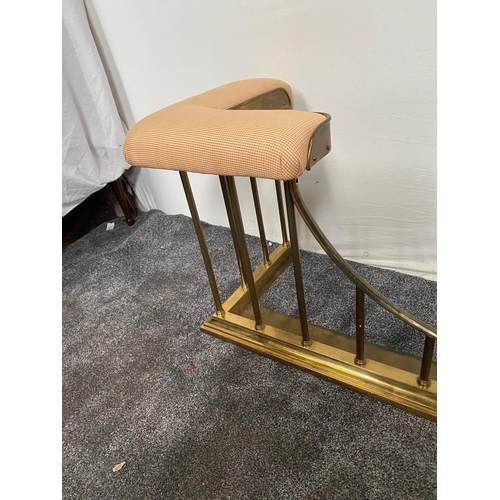 76 - Brass club fender with upholstered seat. {56 cm H x 134 cm W x 44 cm D}.
