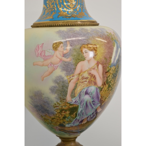 78 - Decorative ceramic and hand painted urn with ormolu mounts.{65 cm H  x 30 cm W}.