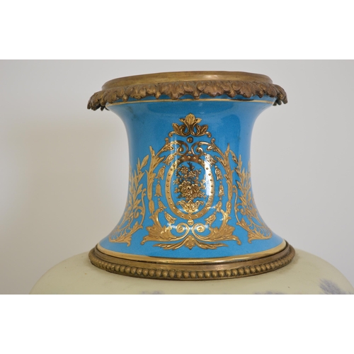 78 - Decorative ceramic and hand painted urn with ormolu mounts.{65 cm H  x 30 cm W}.