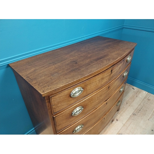82 - Good quality early 19th C. bow fronted chest of drawers with four graduated drawers and brass handle... 