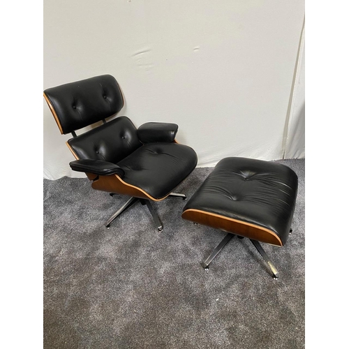 84 - Black leather chair with matching stool raised on chrome base in the Eames style.