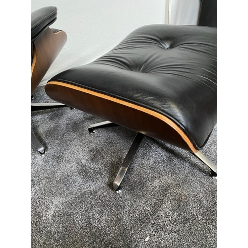 84 - Black leather chair with matching stool raised on chrome base in the Eames style.