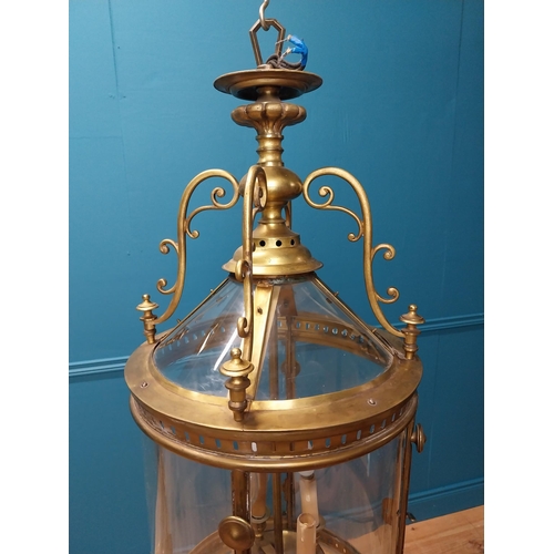 214 - Good quality 19th C. gilded brass and glass hall lantern {110 cm H x 40 cm Dia.}.