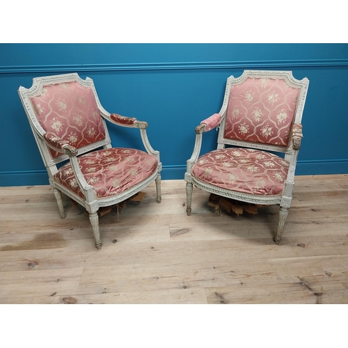 215 - Pair of 19th C. French open armchairs with carved pine frames and upholstered seats on reeded legs {... 