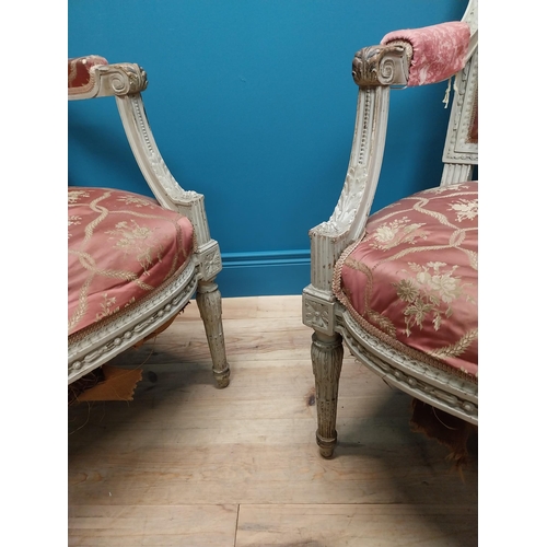 215 - Pair of 19th C. French open armchairs with carved pine frames and upholstered seats on reeded legs {... 