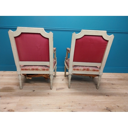 215 - Pair of 19th C. French open armchairs with carved pine frames and upholstered seats on reeded legs {... 