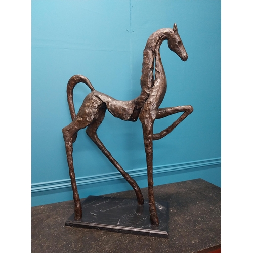 220 - Contemporary bronze sculpture of a horse on a marble base {88cm H x 62 cm W x27 cm D}