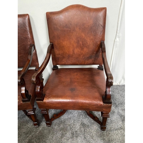 264 - Pair of good quality mahogany and leather upholstered armchairs.