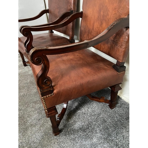 264 - Pair of good quality mahogany and leather upholstered armchairs.