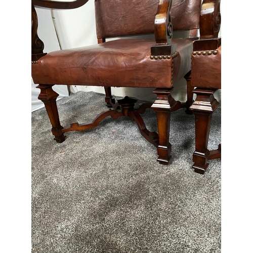 264 - Pair of good quality mahogany and leather upholstered armchairs.