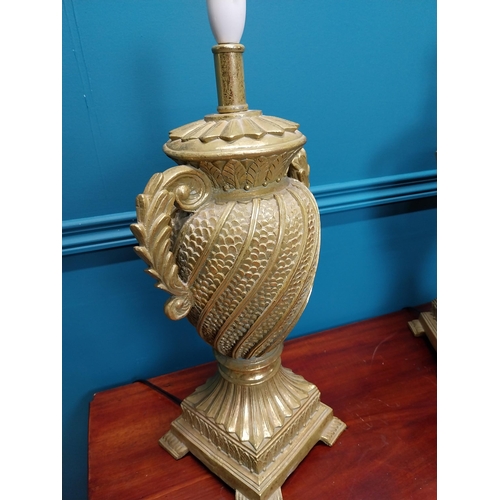 271 - Pair of gilt resin table lamps in the form of urns {55 cm H x 25 cm W x 19 cm D}.