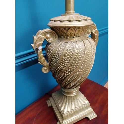 271 - Pair of gilt resin table lamps in the form of urns {55 cm H x 25 cm W x 19 cm D}.