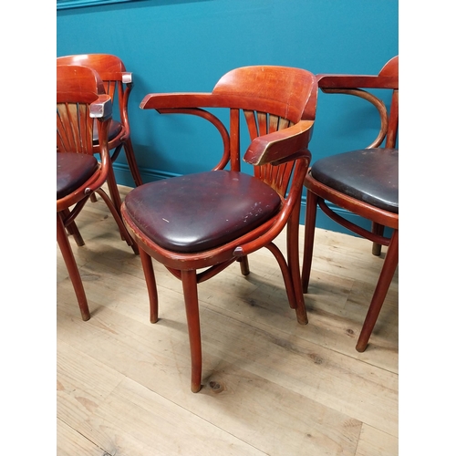 274 - Set of four bentwood arm chairs with vinyl upholstered seats {76 cm H x 60 cm W x 47 cm D}.