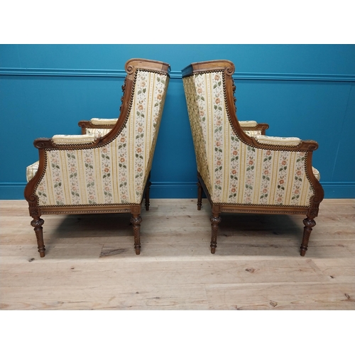 276 - Pair of 19th C. carved mahogany and upholstered arm chairs raised on turned legs {102 cm H x 68 cm W... 