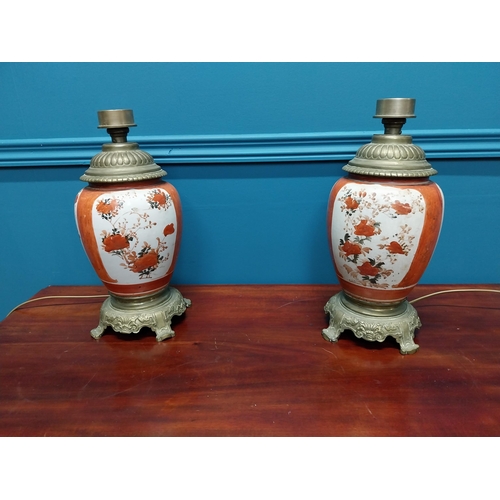 283 - Pair of 19th C. brass and ceramic oriental table lamps {34 cm H}.