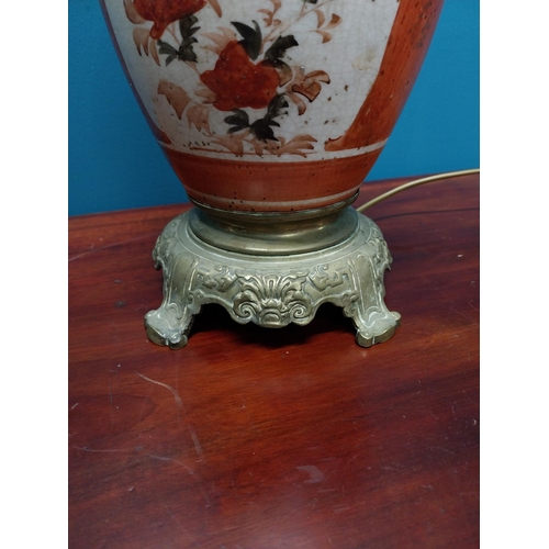 283 - Pair of 19th C. brass and ceramic oriental table lamps {34 cm H}.