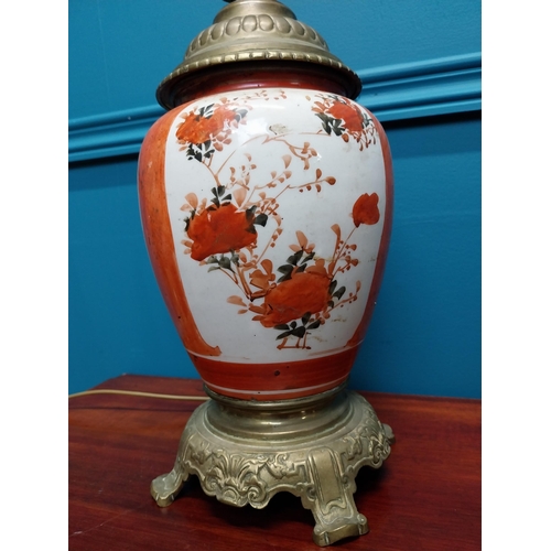 283 - Pair of 19th C. brass and ceramic oriental table lamps {34 cm H}.