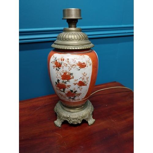 283 - Pair of 19th C. brass and ceramic oriental table lamps {34 cm H}.