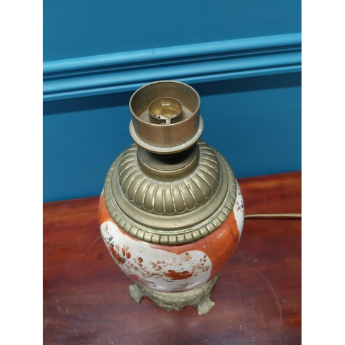 283 - Pair of 19th C. brass and ceramic oriental table lamps {34 cm H}.