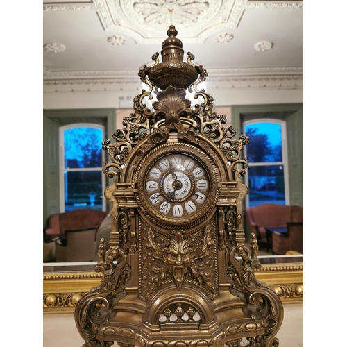 284 - Decorative brass mantle clock {62 cm H x 37 cm W x 15 cm D}.