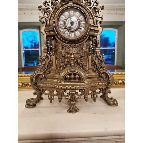 284 - Decorative brass mantle clock {62 cm H x 37 cm W x 15 cm D}.