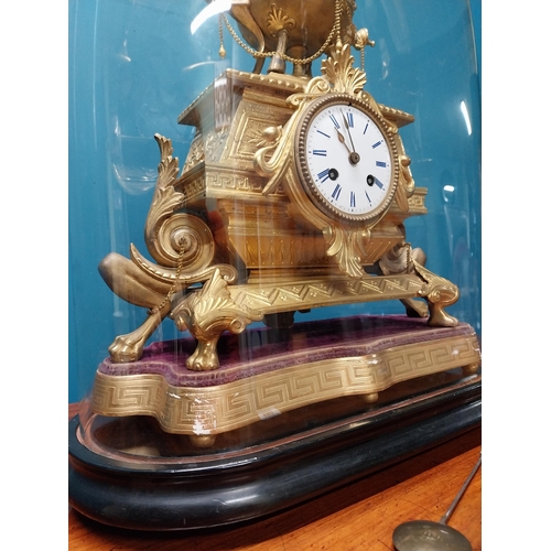 290 - Good quality French gilded metal mantle clock in glass dome {54 cm H x 40 cm W x 21 cm D}.