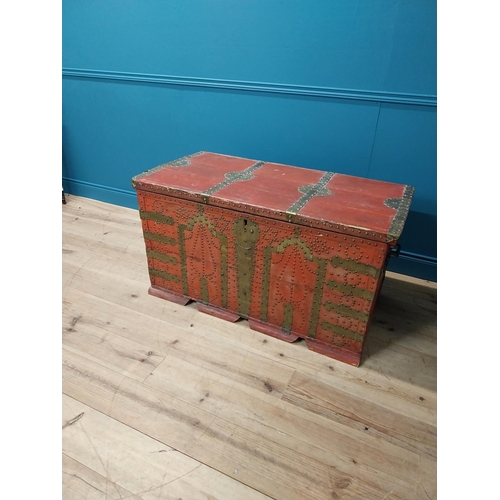 297 - Early 20th C. painted pine trunk with brass stud decoration {67 cm H x 123 cm W x 67 cm D}.