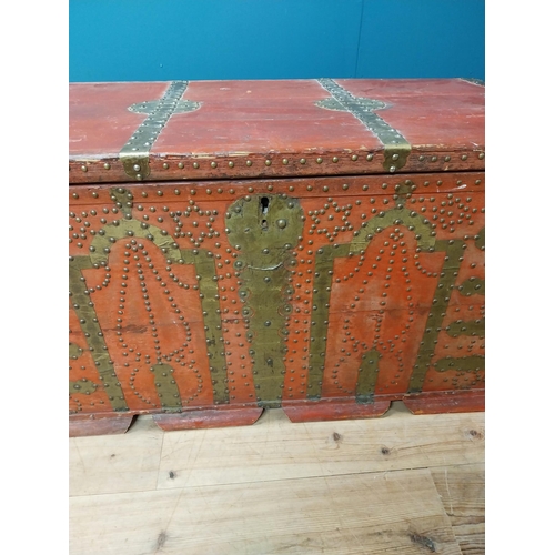 297 - Early 20th C. painted pine trunk with brass stud decoration {67 cm H x 123 cm W x 67 cm D}.