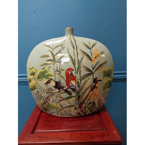 193 - Decorative hand painted ceramic vase depicting birds {35 cm H x 34 cm W x 12 cm D}.