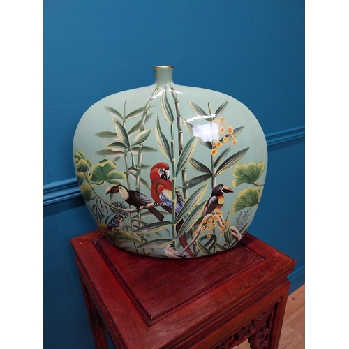 193 - Decorative hand painted ceramic vase depicting birds {35 cm H x 34 cm W x 12 cm D}.