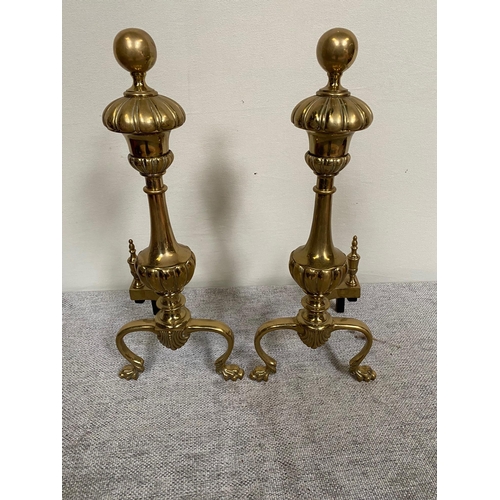 197 - Pair of brass fire dogs {54 cm H}.