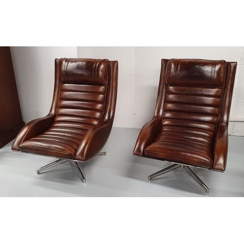 148 - Pair of exceptional quality leather and chrome lounging armchairs on four chrome splayed legs in the... 