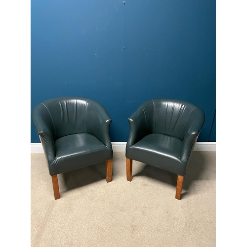 323 - Pair of leather upholstered tub chairs, raised on square legs {  80 cm H X 70 cm W  X 70 cm D }.