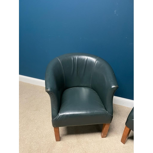 323 - Pair of leather upholstered tub chairs, raised on square legs {  80 cm H X 70 cm W  X 70 cm D }.