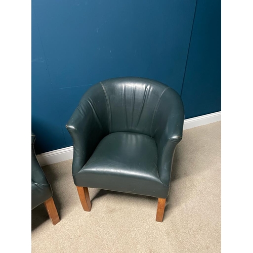 323 - Pair of leather upholstered tub chairs, raised on square legs {  80 cm H X 70 cm W  X 70 cm D }.