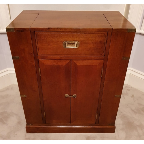 326 - Exceptional quality teak drinks cabinet with brass mounts in the campaign style {89 cm H x 69 cm W x... 