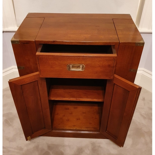 326 - Exceptional quality teak drinks cabinet with brass mounts in the campaign style {89 cm H x 69 cm W x... 