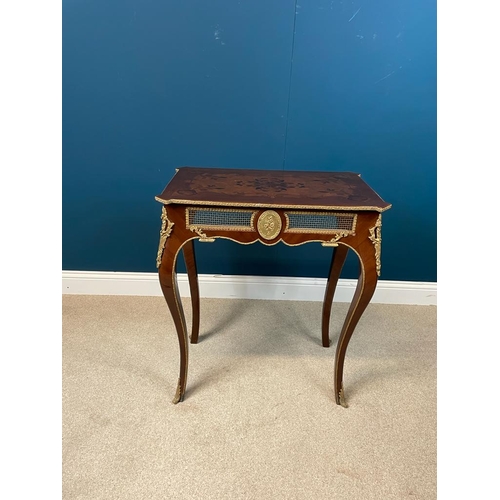 59 - Decorative inlaid kingwood side table with gilded brass mounts in the frieze with a oval plaque deco... 