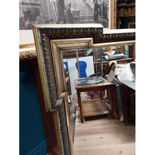 173 - Decorative 19th C. gilt wall mirror {104 cm H x 79 cm W}.