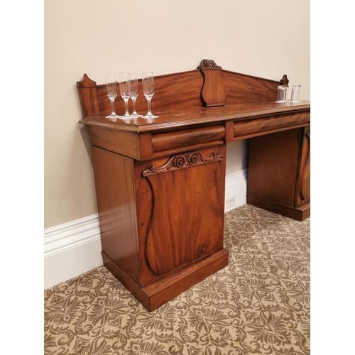 225A - 19th. C. mahogany pedestal sideboard the blind back above a centre drawer above two  panelled doors ... 