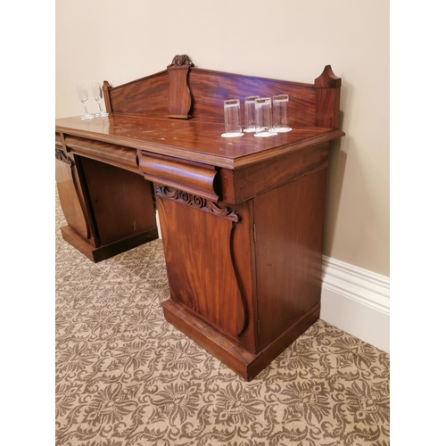 225A - 19th. C. mahogany pedestal sideboard the blind back above a centre drawer above two  panelled doors ... 