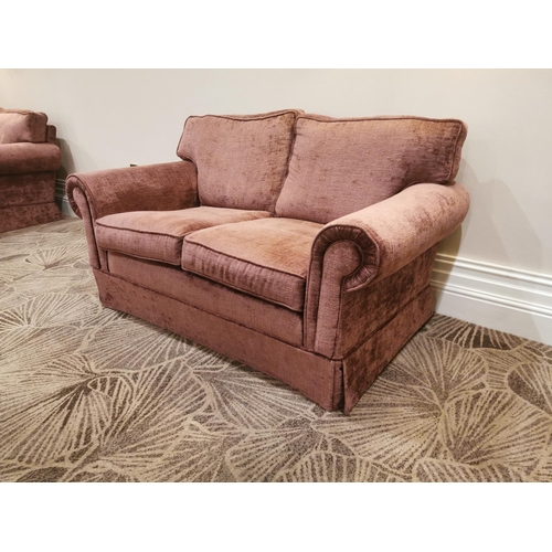 139A - Mahogany and crushed velvet upholstered two seater sofa.